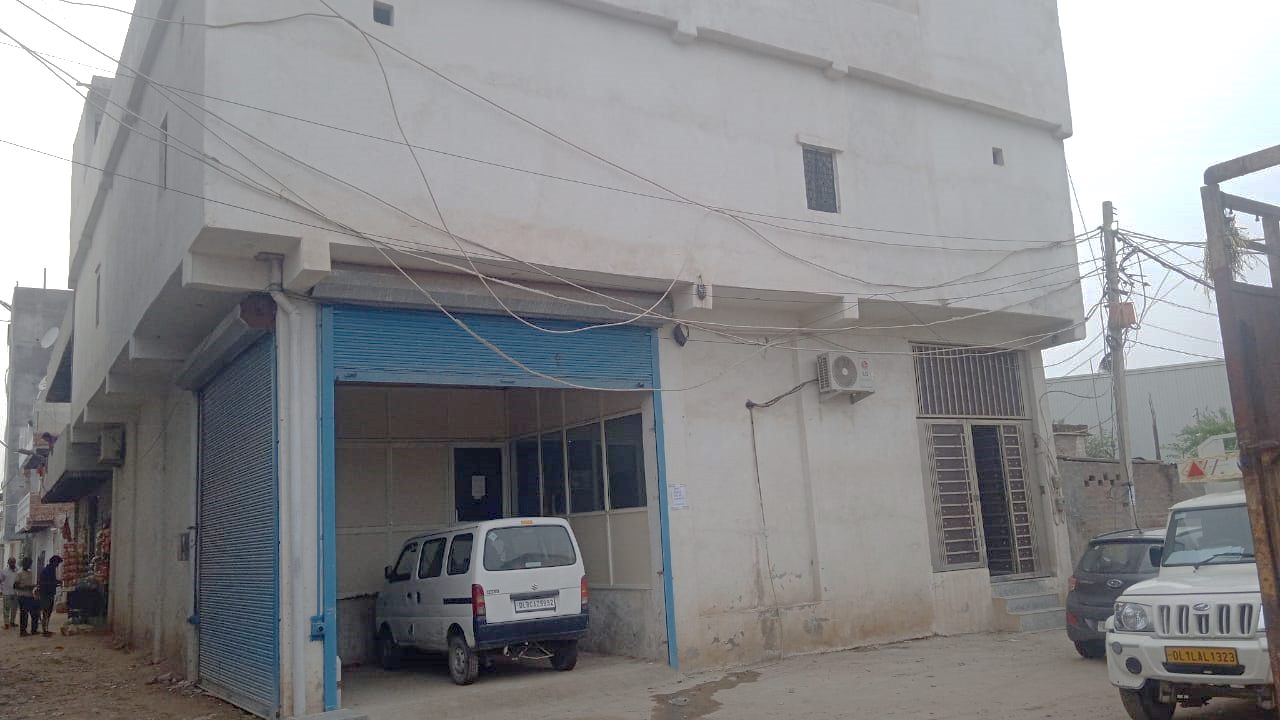 Exterior of a warehouse and processing building.